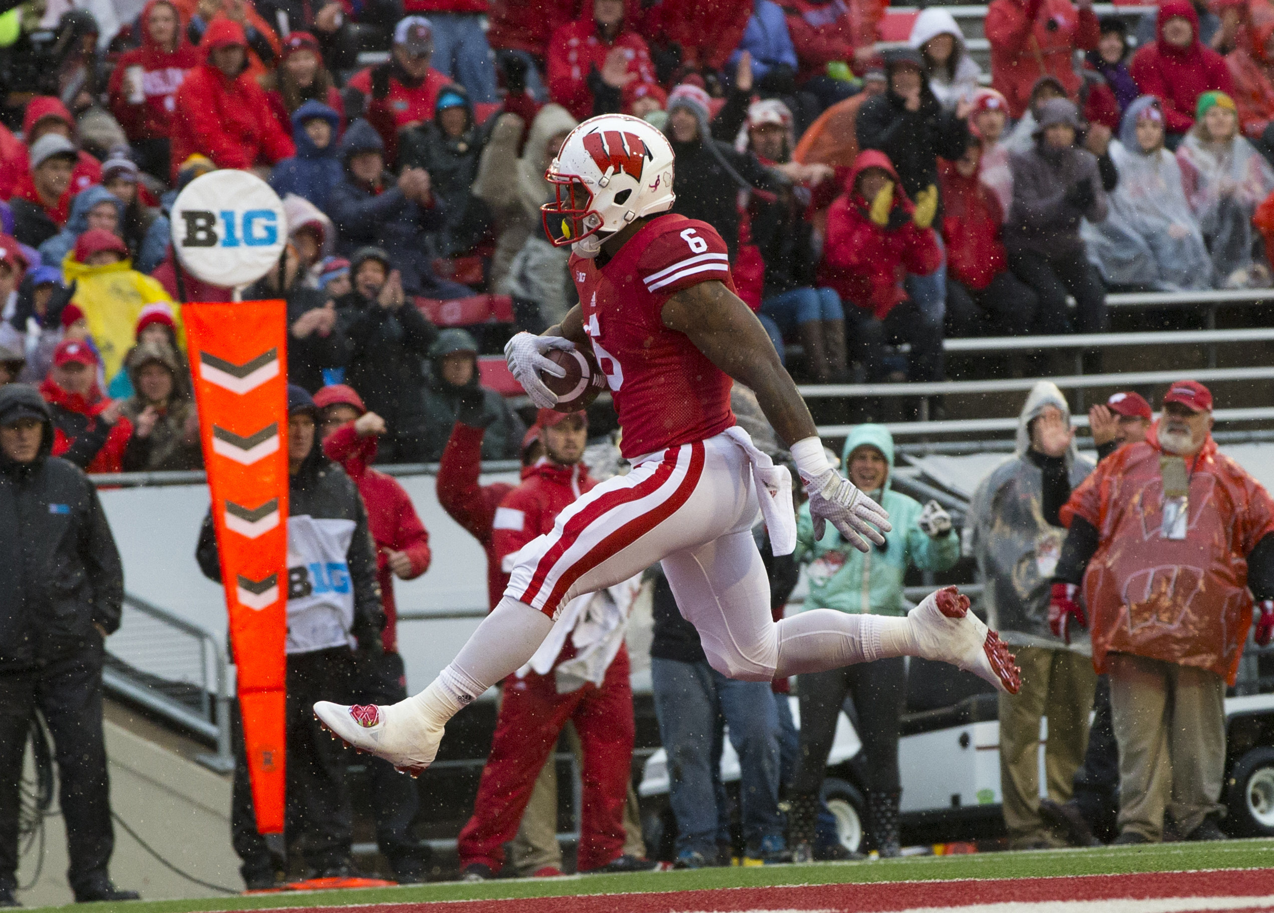 Oct 31, 2015; Madison, WI, USA; Wisconsin Badgers running back Corey Clement (6) rushes for a touchdown during the first quarter against the Rutgers Scarlet Knights at Camp Randall Stadium. Mandatory Credit: Jeff Hanisch-USA TODAY Sports